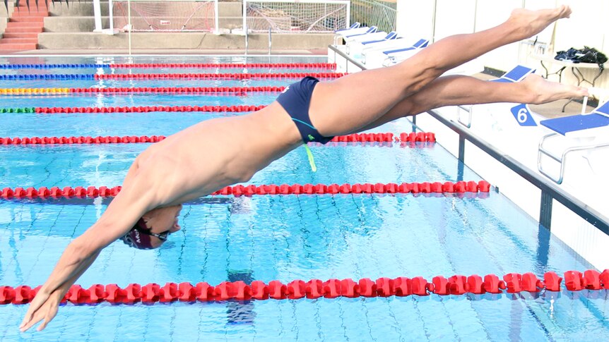 Swimmer Cameron McEvoy dives into a pool