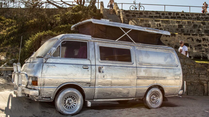 Homeless Carapace, a foil covered by van by Tim Burns with Gary Carter and Tatjana Seserko. Sculpture by the Sea March 4, 2016.