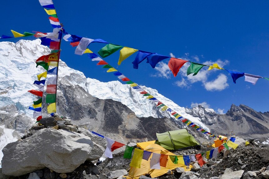 Tents and prayer flags at site of Mount Everest base camp in May 2017