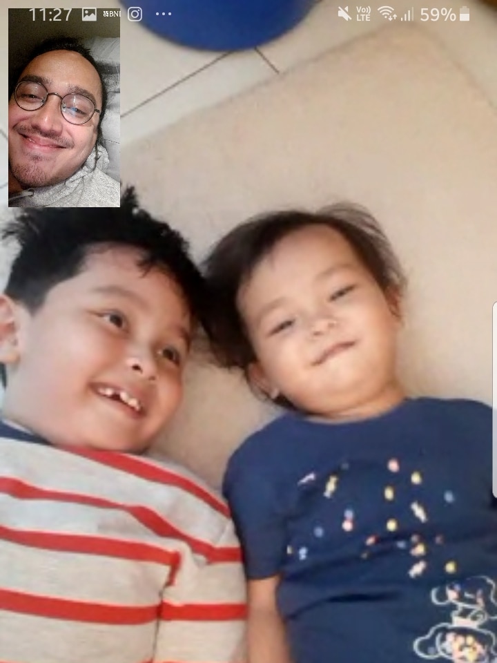 A screenshot of Giovanni van Empel talking to his children during a video call.