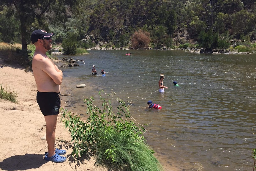 People play in the water at Casuarina Sands.