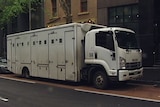Prison van waiting outside the Melbourne Magistrates Court