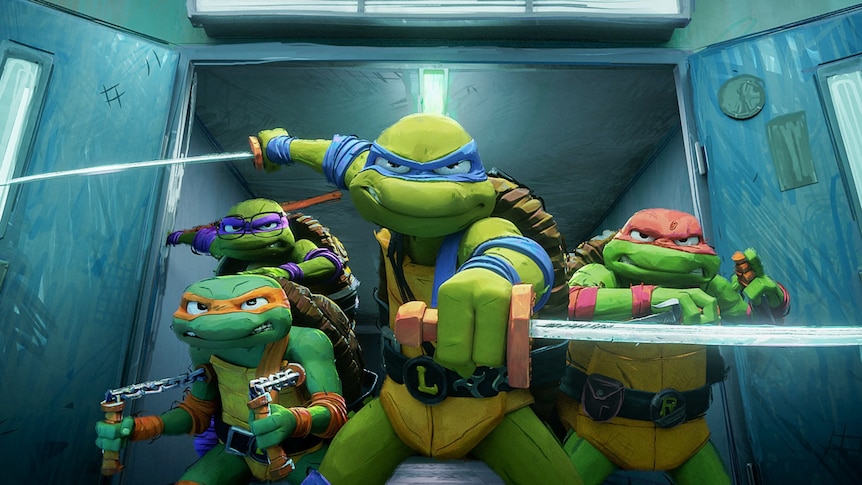 Four green cartoon mutant turtles burst through a set of doors, weapons drawn, including swords