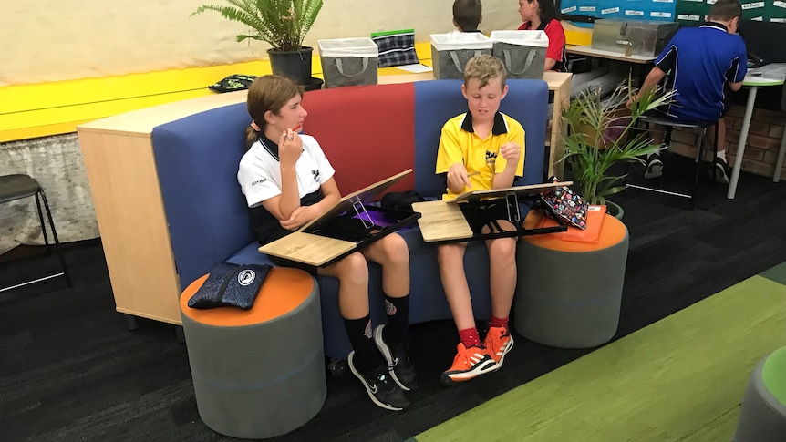Children at Vasse Primary School using sofas and ottomans in the classroom.