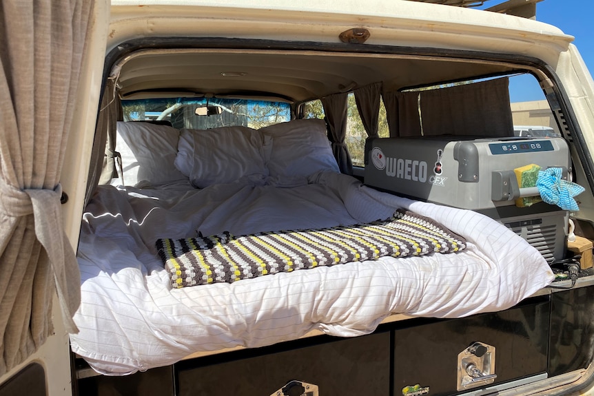 A mattress inside a car where backpacker Sam Lopez sleeps every night.