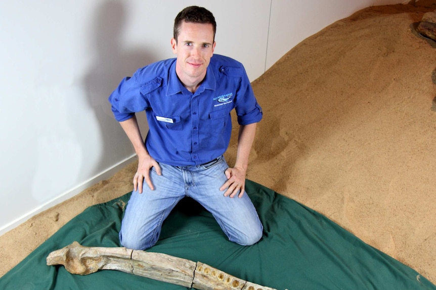 Dr Timothy Holland with the mandible of the Kronosaurus.