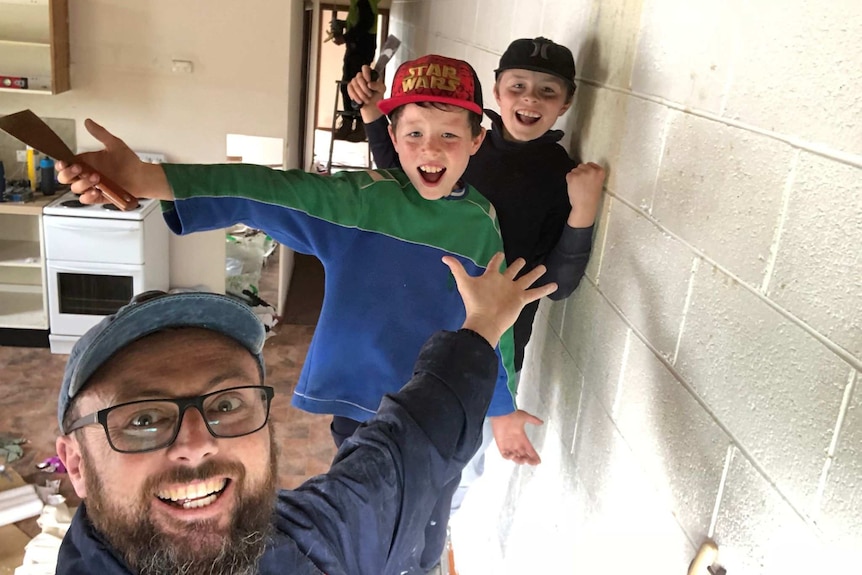 Trevlyn McCallum (left) working on a DIY project with some children