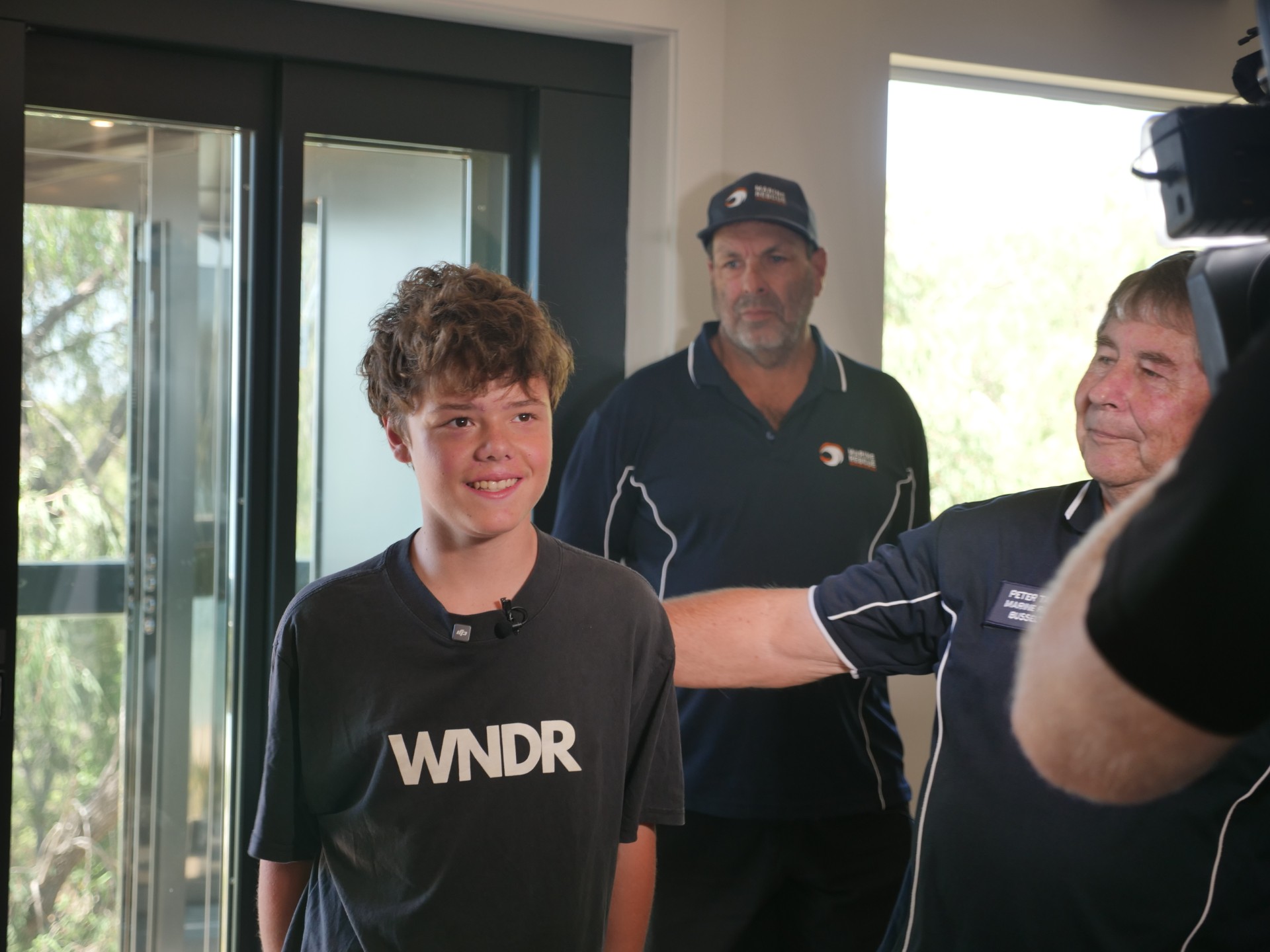 Hero teen reunited with rescuers who saved family swept out to sea