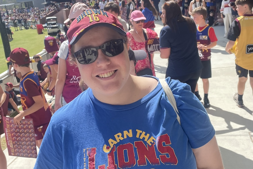 Wendy Litherland wears a Lions shirt and maroon cap