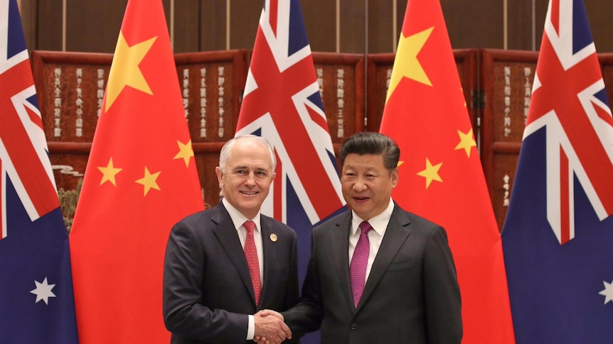 Prime Minister Malcolm Turnbull and President Xi Jinping shake hands