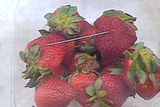 A punnet of strawberries purchased in a Gatton supermarket with a piece of metal inside.