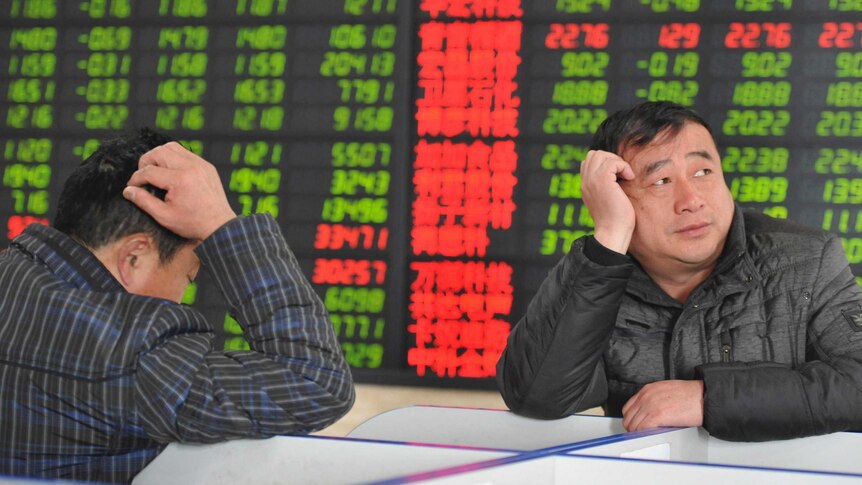 Investors looks at stock results in China