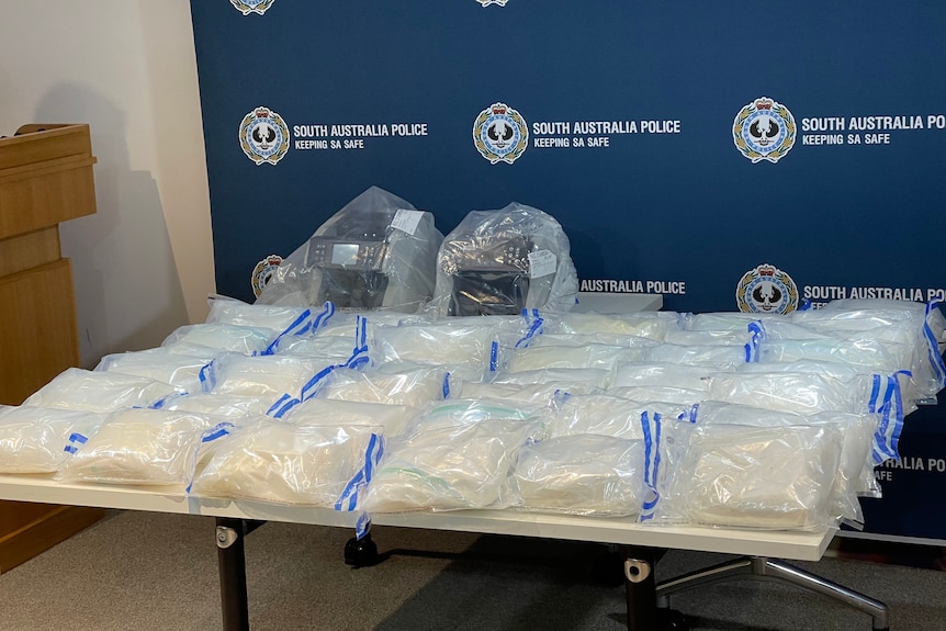 Police display of bags containing methylamphetamine.