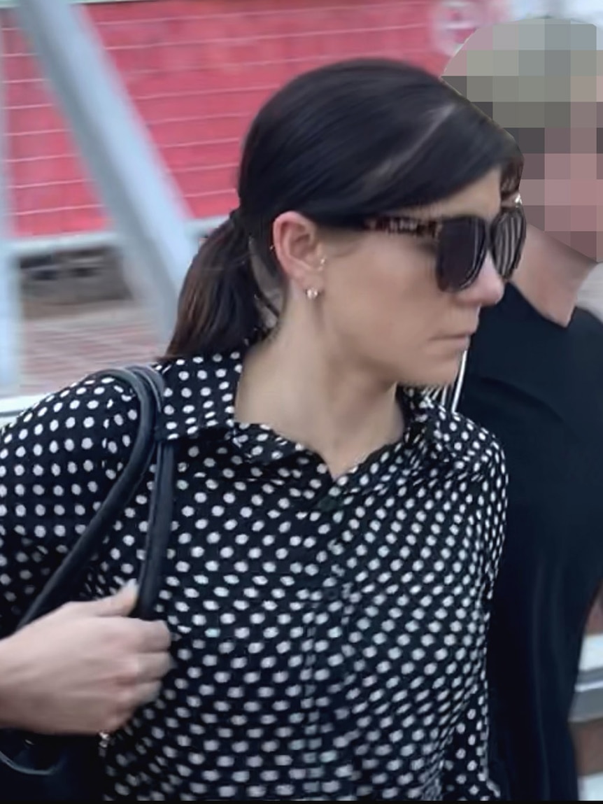 Teacher Sarah Joy Guazzo leaves court after she is acquitted of sexual offences with a student
