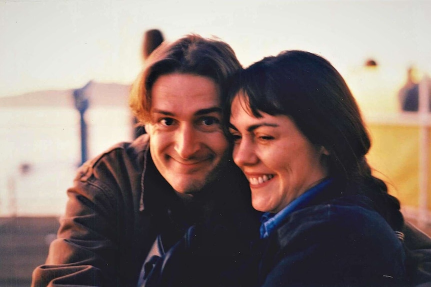 A photograph of a smiling couple