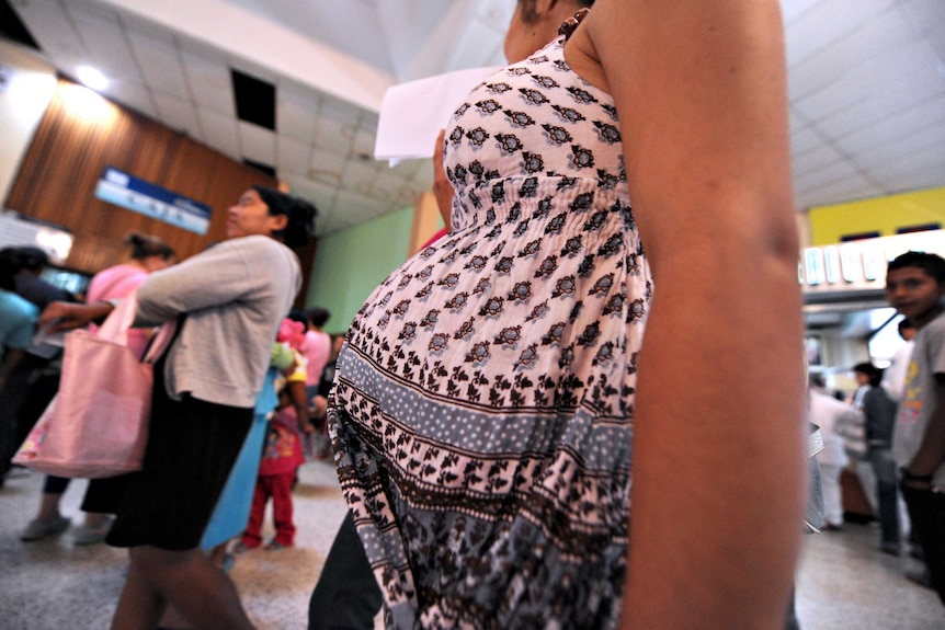 A pregnant woman in Honduras waits to be tested for the Zika virus