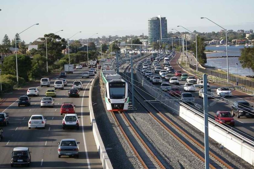 A train takes a test run on the new Perth to Mandurah train line in Western Australia in November 2007.