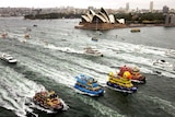 Boats race on the water.