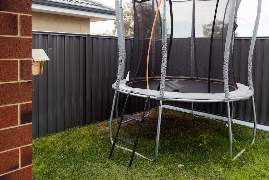 A trampoline in Angie and Gilbert Tsuro's backyard.