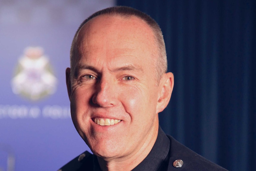 A headshot of a police officer.