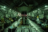 Australian, New Zealand and Afghan citizens on a military plane evacuating Afghanistan
