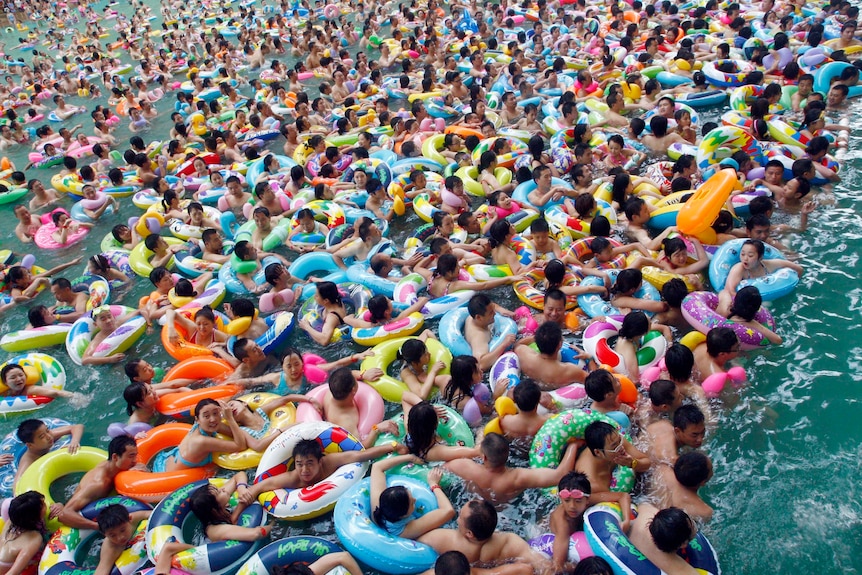 An crowded Chinese swimming pool