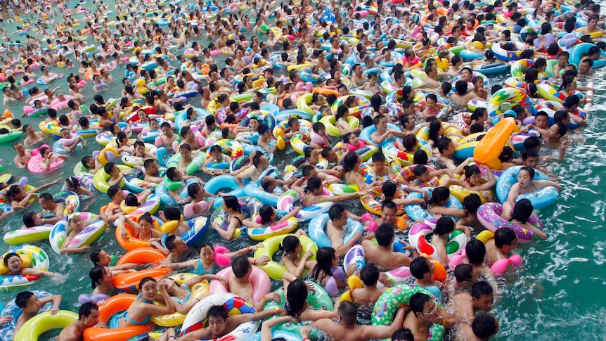 An crowded Chinese swimming pool