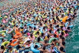 An crowded Chinese swimming pool