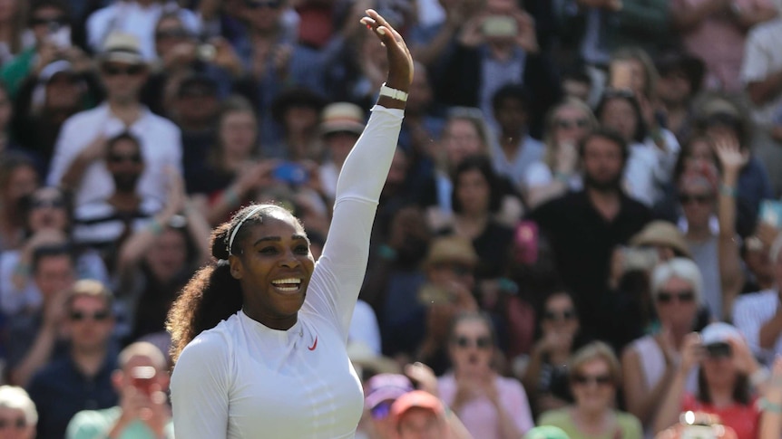 Serena Williams celebrates winning against Italy's Camila Giorgi at Wimbledon on July 10, 2018.