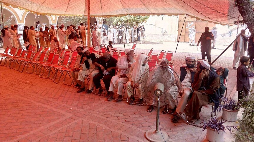 Refugees joining the queues for resettlement support in Bara, Khyber Agency