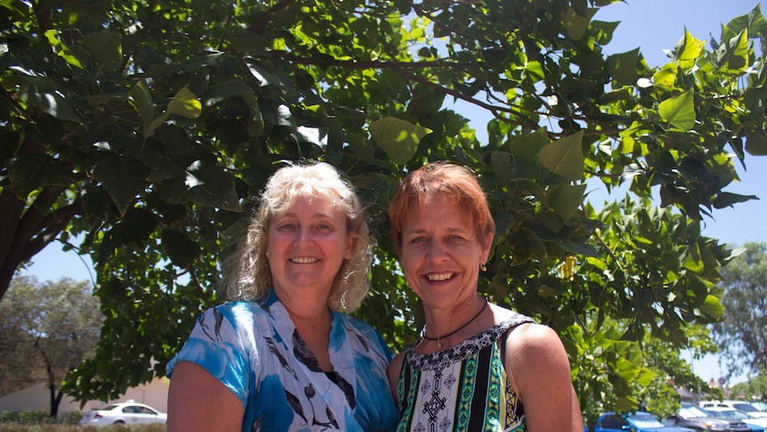 Down Syndrome WA family support officer Julie Ireland and Kalgoorlie-Boulder local Jo Russell on Hannan Street.