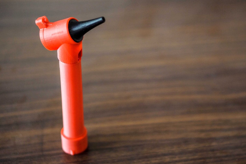 A 3D-printed plastic otoscope.