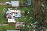 An aerial view of wrecked homes after a cyclone