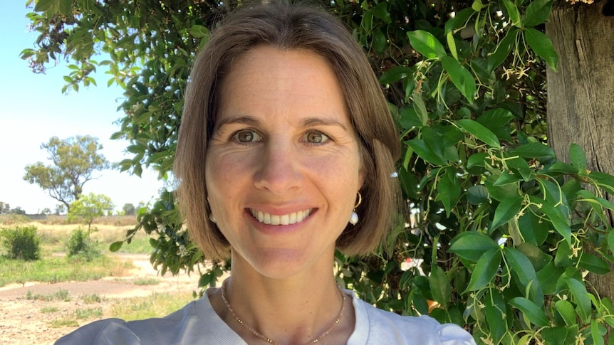 selfie of a woman smiling at the camera