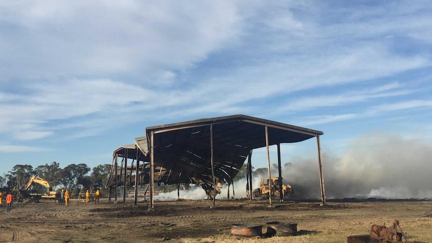 A damaged shed, the only thing remaining after a haystack fire in Douglas, western Victoria.