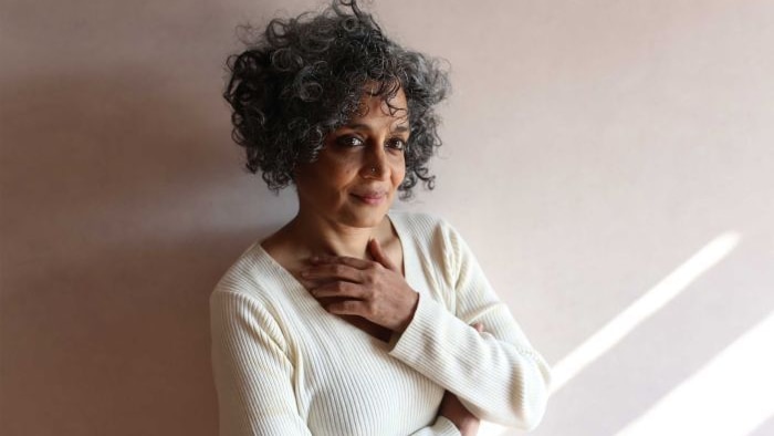 Man Booker-winning author Arundhati Roy poses for a photo.