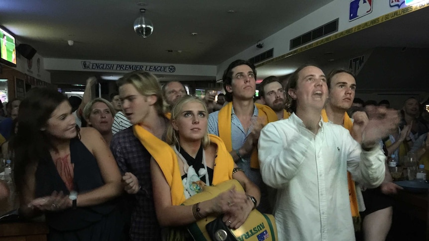 Australian rugby fans watch the World Cup in a Sydney pub