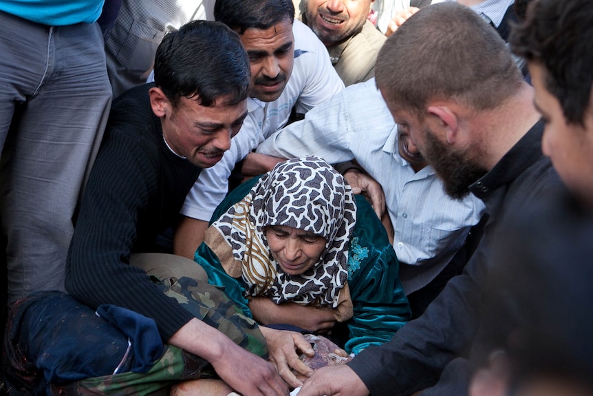 A mother mourns the death of her son in Syria