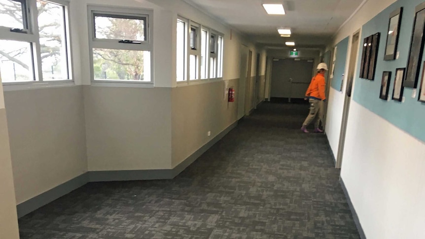 A school hallway with wheelchair bay