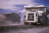 Coal trucks at open cut mine