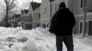 Frozen lake moves towards houses in Minnesota