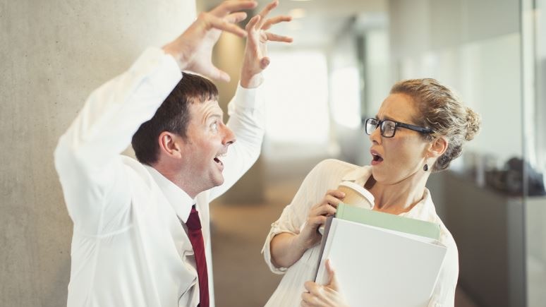 Man with snarling hands, reeling woman