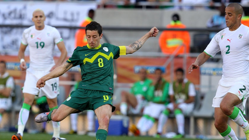 Soft goal: Robert Koren's shot was sneaked past Algeria 'keeper Faouzi Chaouchi.