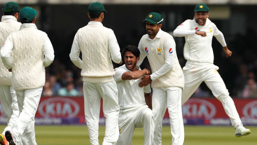 Pakistan players celebrate a wicket against England on day one at Lord's on May 24, 2018.