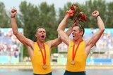 Duncan Free (L) and Drew Ginn with their gold medals at the Beijing Olympics on August 16, 2008.