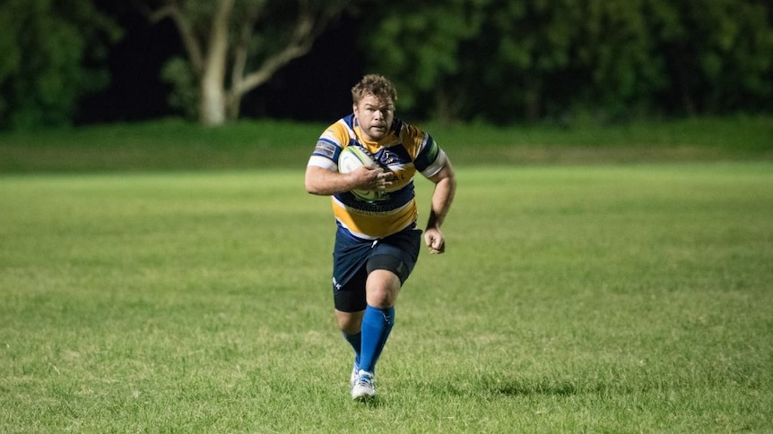 rugby player with ball