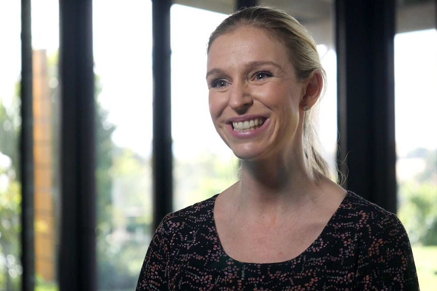 Image of a woman being interviewed at the vineyards