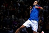 Jo-Wilfried Tsonga celebrates winning his match against Rafael Nadal.