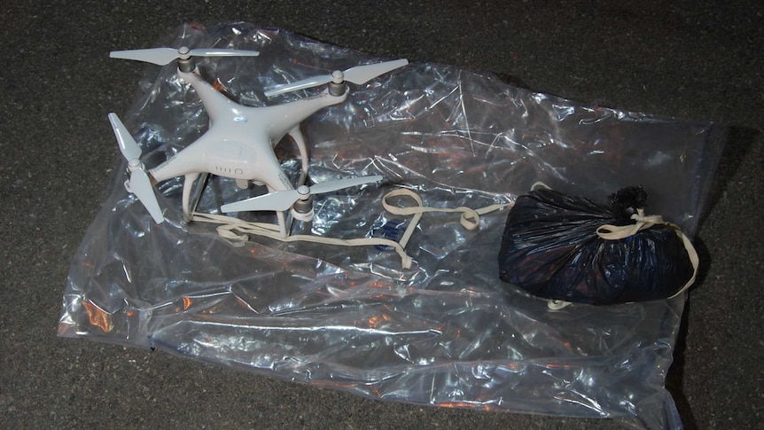 Image of drone with bag. Officers from Islington are appealing for witnesses following the recovery near a London prison.
