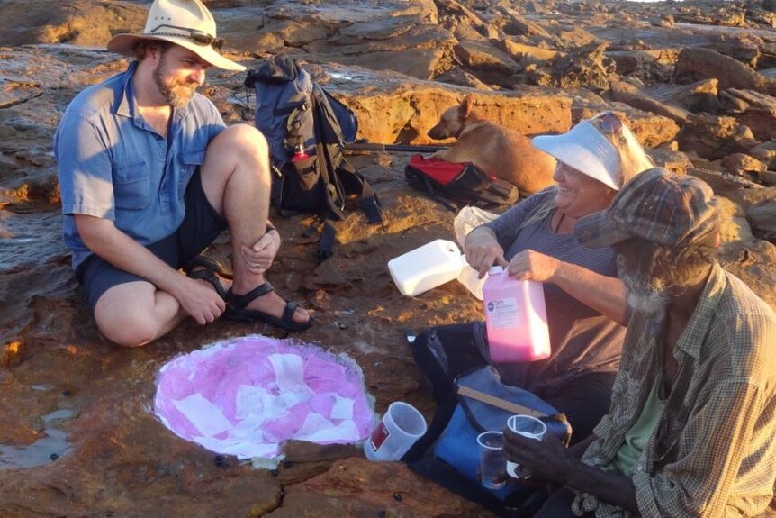 Steve Salisbury, Louise Middleton, Richard Hunter make a cast of a theropod footprint in the Kimberley.